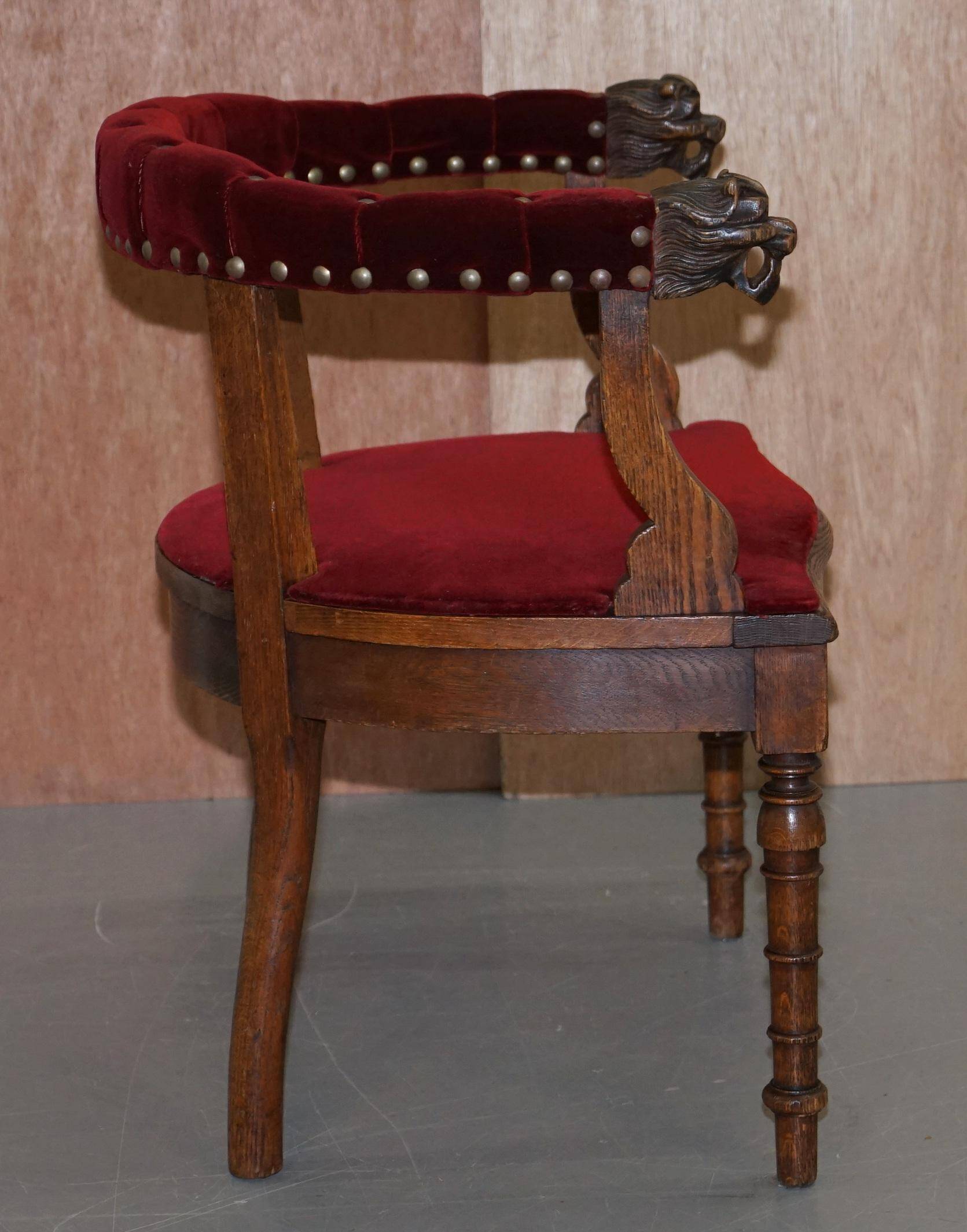 Antique Régence Bergère Armchair in Carved Oak with Lion Head Armrests