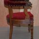 Antique Régence Bergère Armchair in Carved Oak with Lion Head Armrests