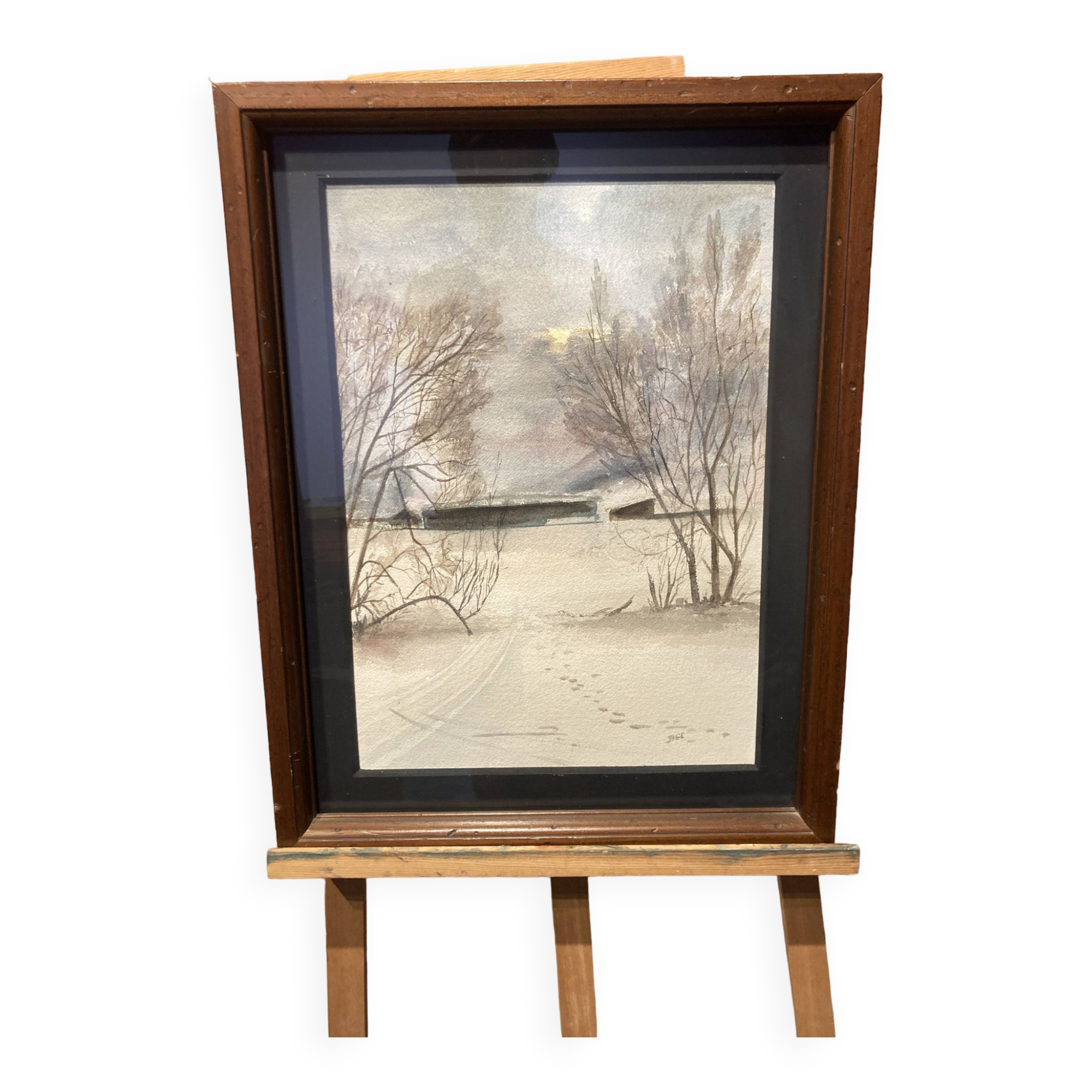 Watercolor framed by a snowy landscape