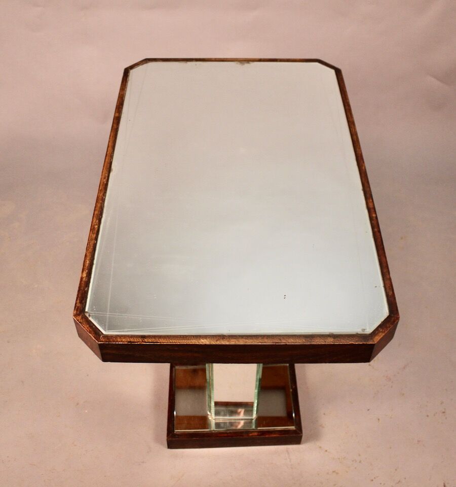 Mirror table from 1940 with two legs.