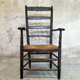 High back straw armchair