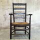 High back straw armchair