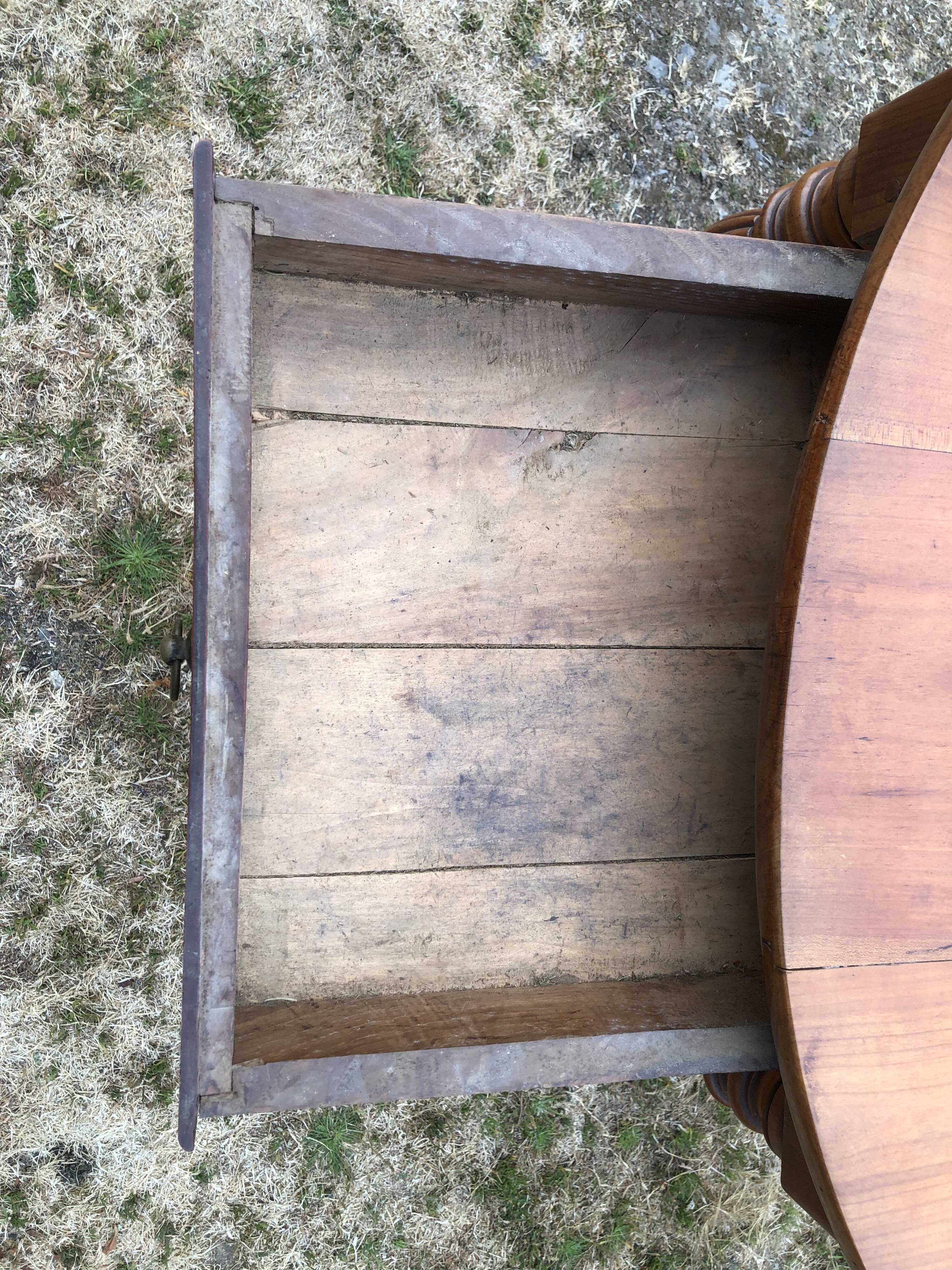 Louis Philippe oval drop-leaf table in solid cherry wood with 2 drawers.