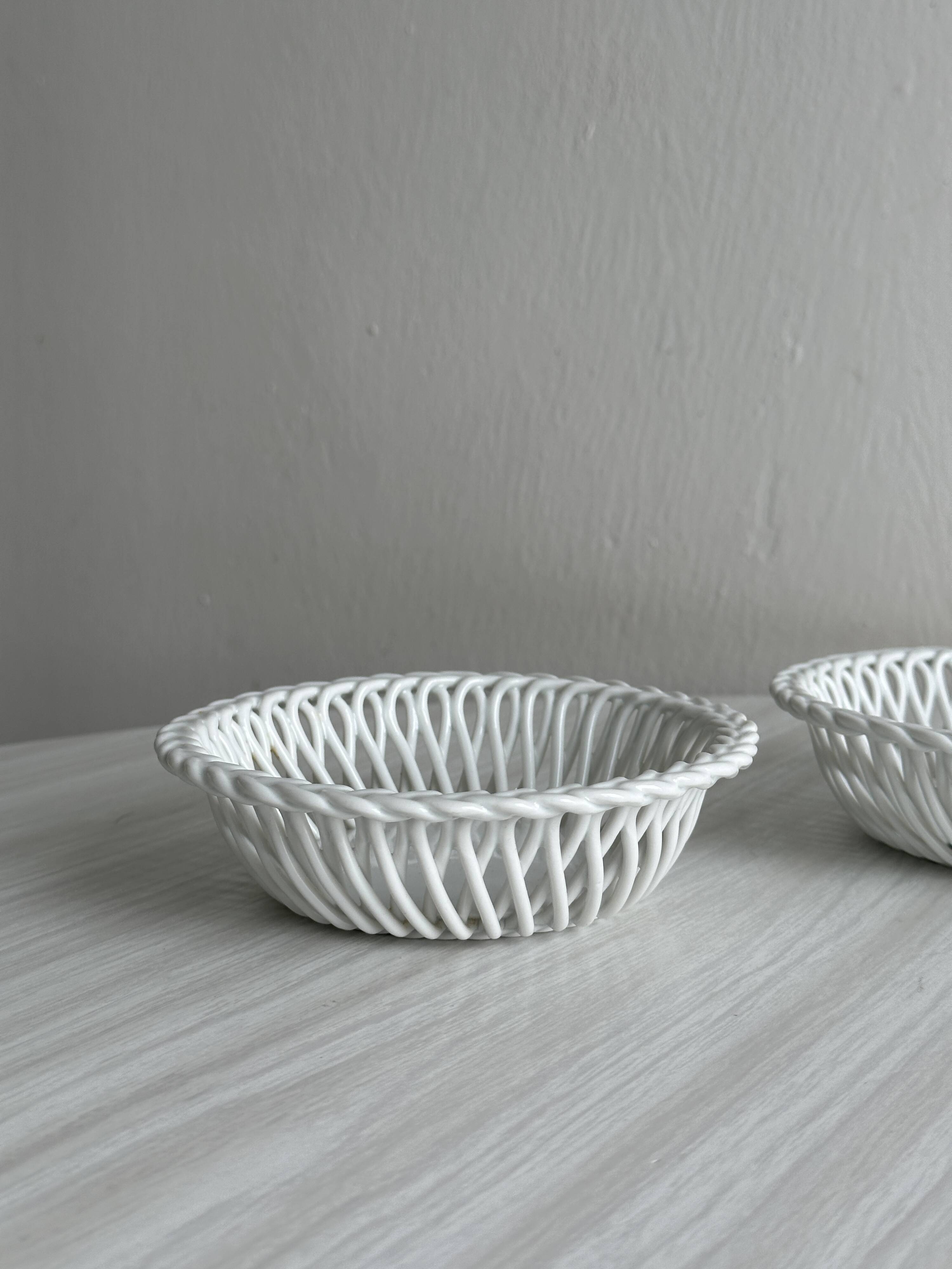 pair of antique twisted porcelain bowls