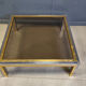 Table basse vintage en chrome et laiton dans le style de Romeo Rega, années 1970.
