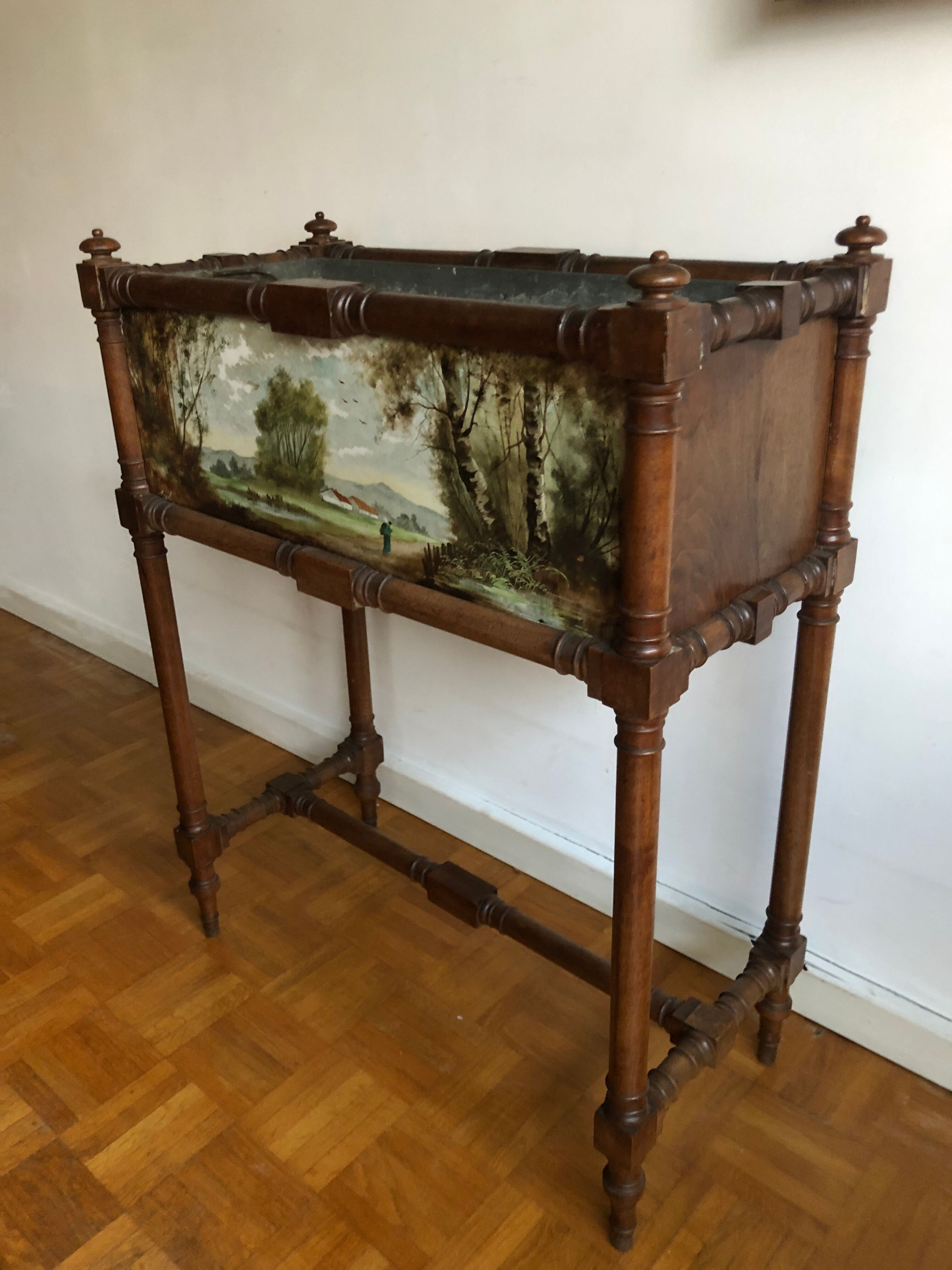 Old planter with painted earthenware