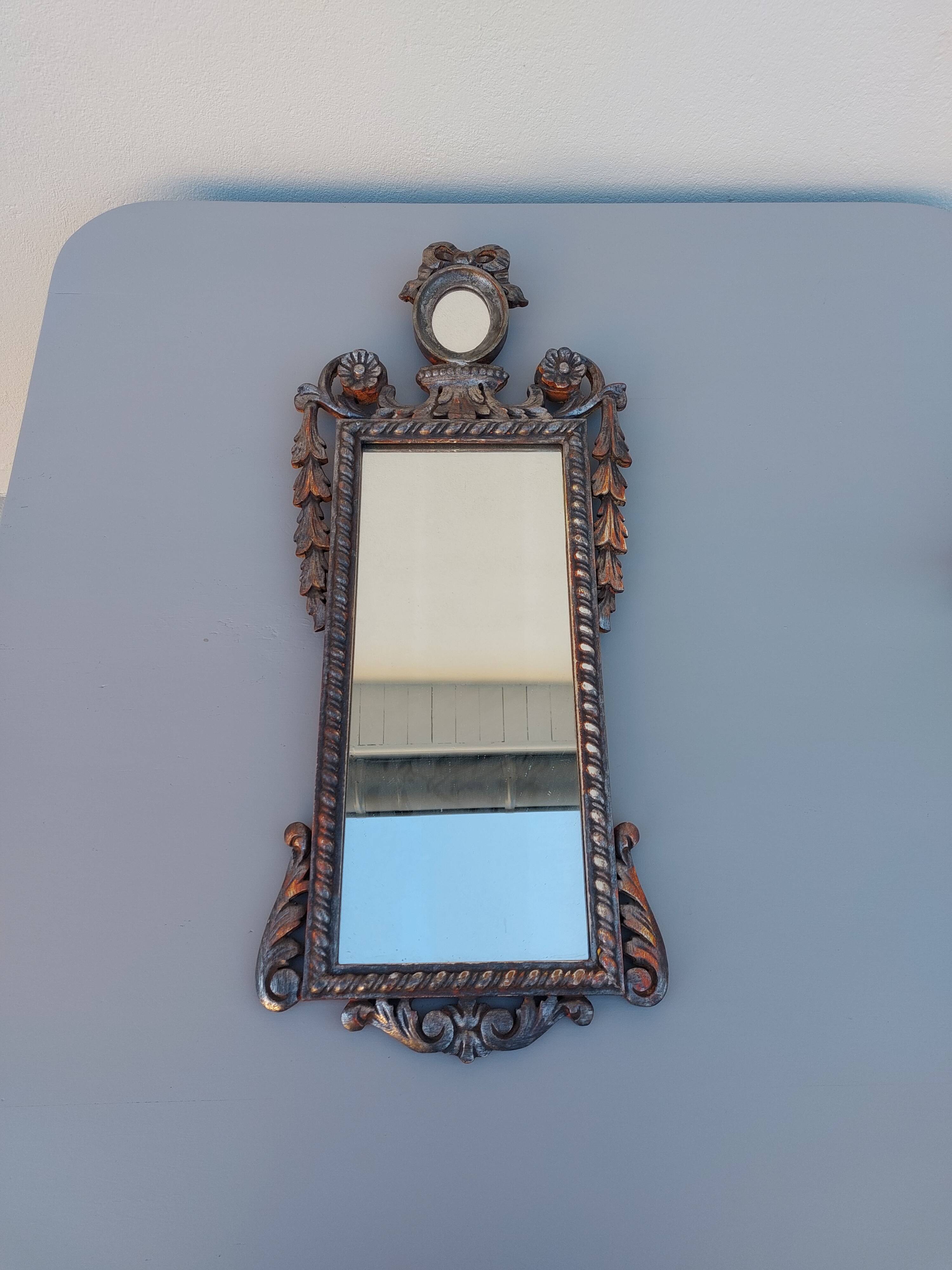 Louis XVI style mirror decorated in wood