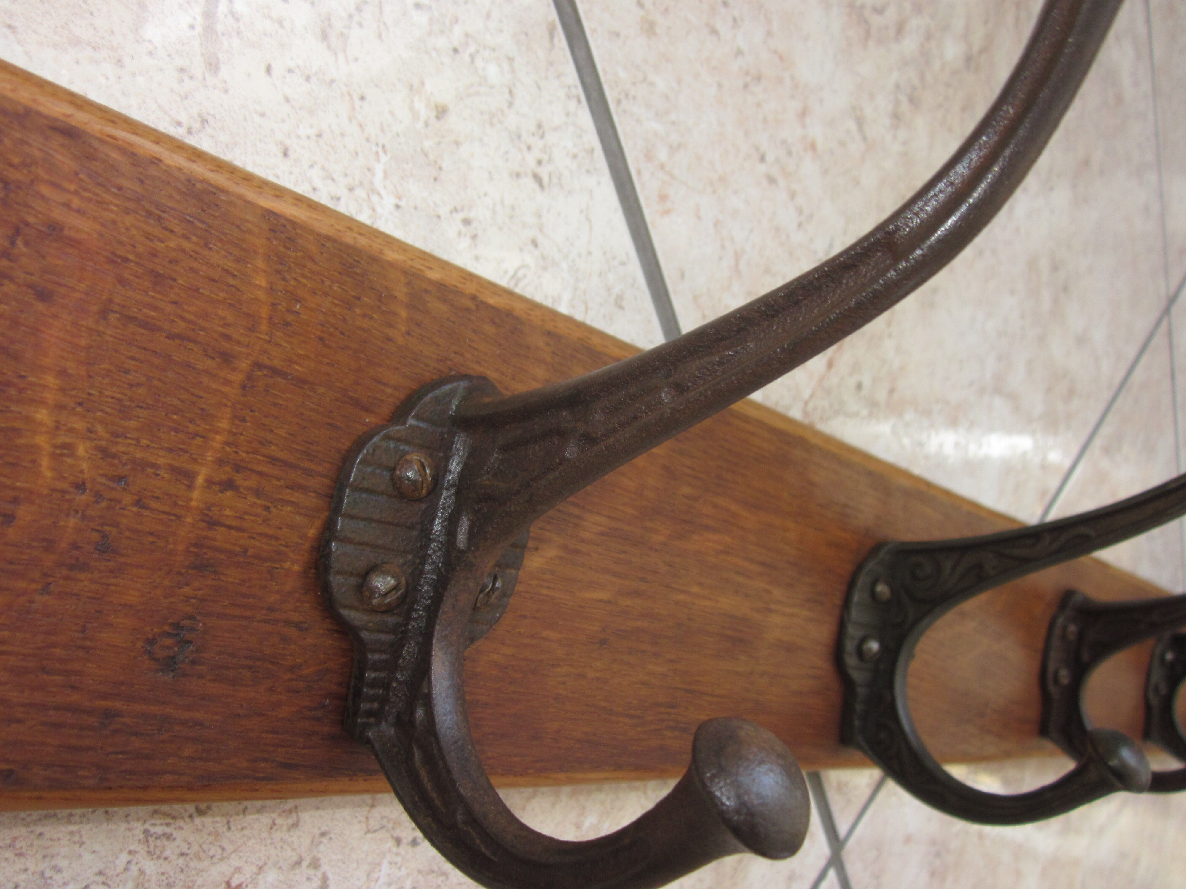 Bistro coat rack has 6 cast iron pads