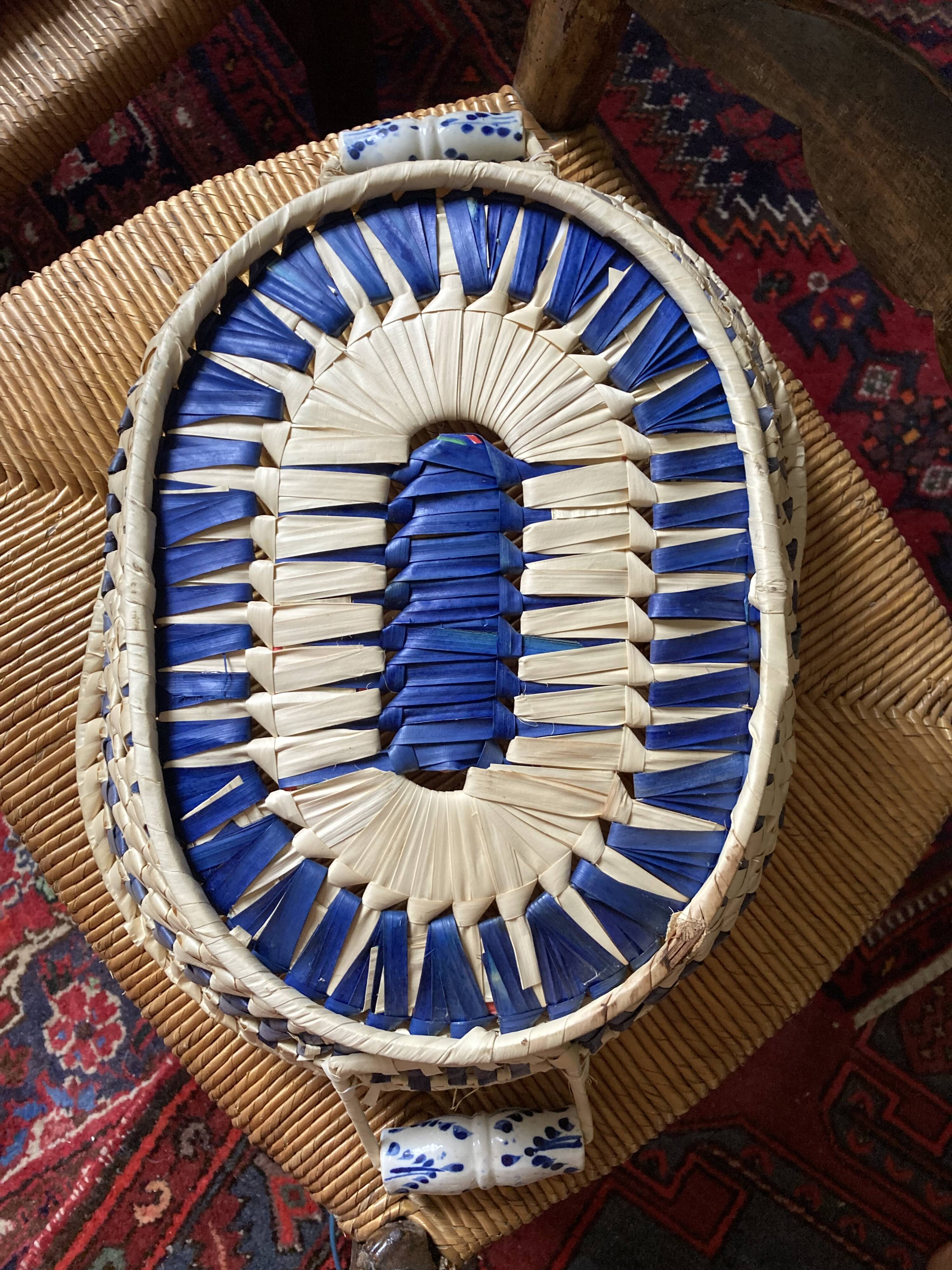 Wicker basket and vintage asymmetrical antique ceramic