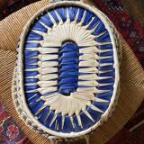 Wicker basket and vintage asymmetrical antique ceramic
