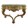 19th-century carved wooden drop-leaf console.