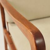 Vintage armchair in olive corduroy with a wooden frame.