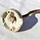 Brass gooseneck wall lamp, with brass socket and porcelain base.