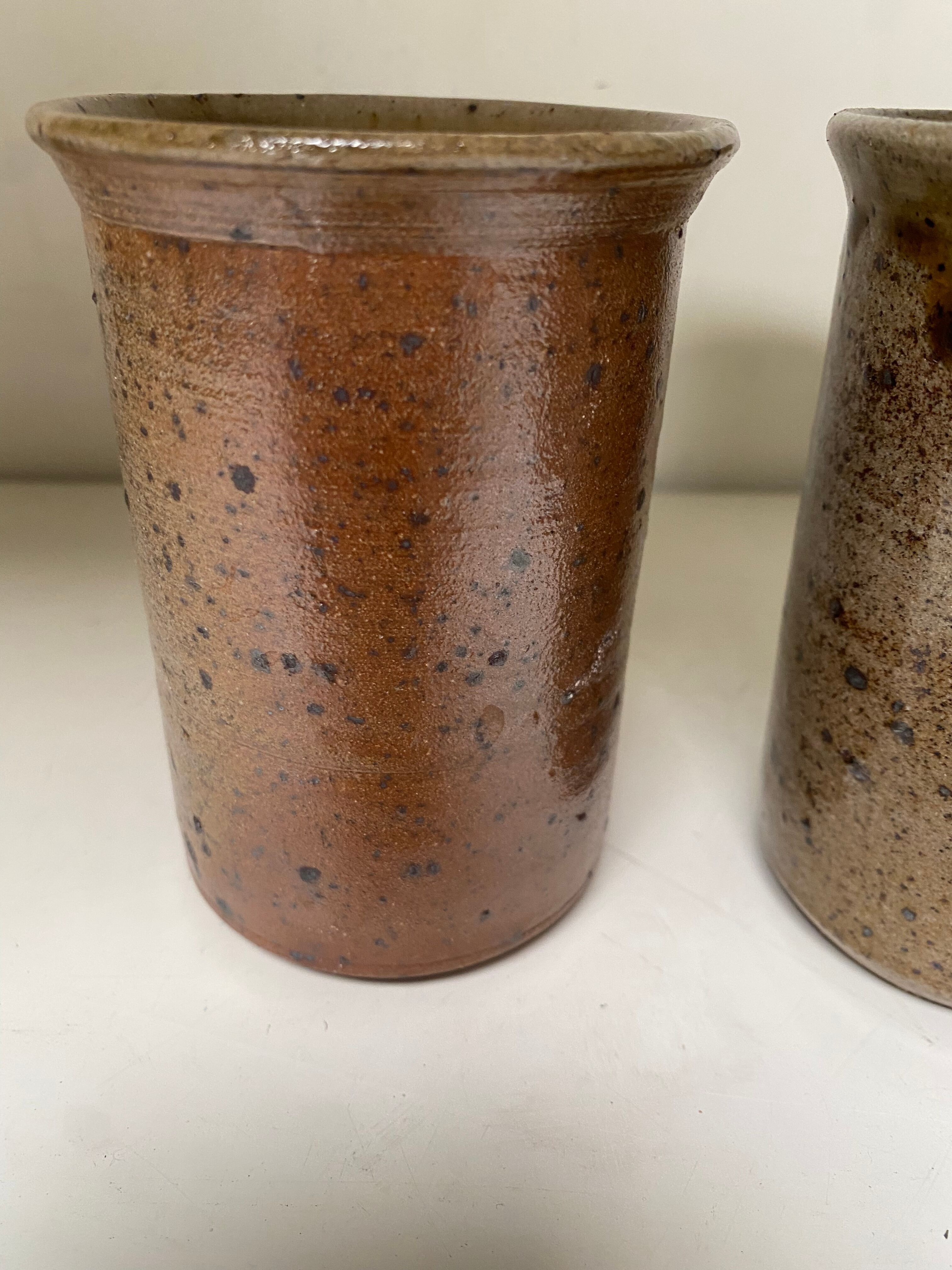 Pair of sandstone mugs