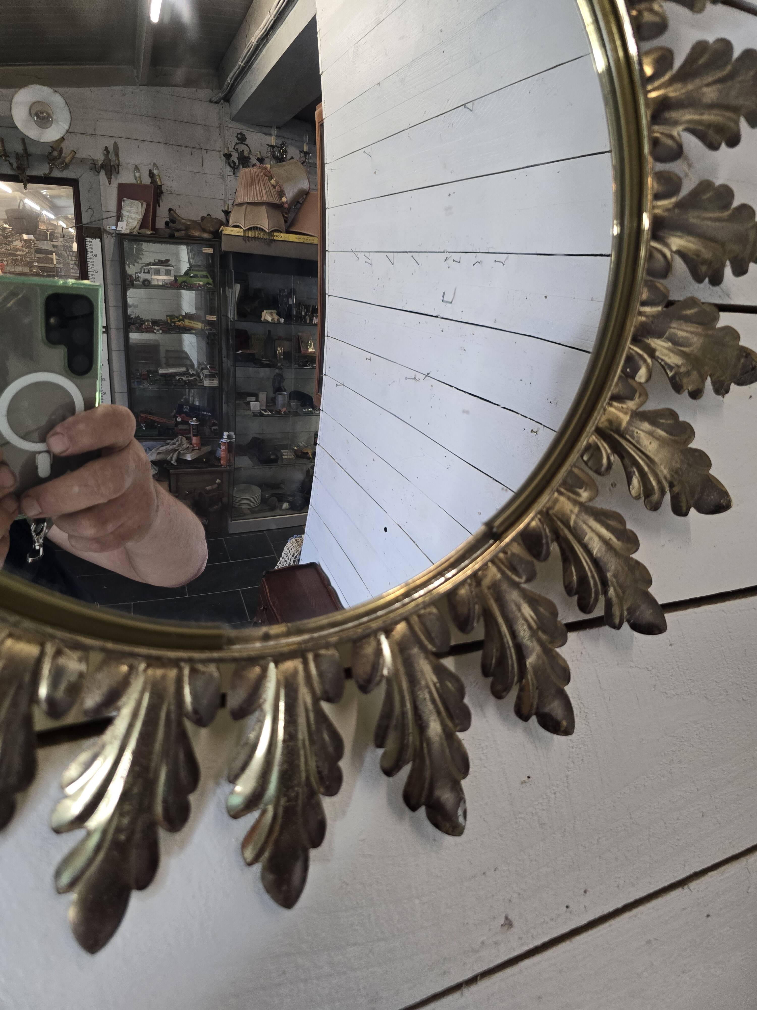 Witch's eye sun mirror in gold metal from the 60s
