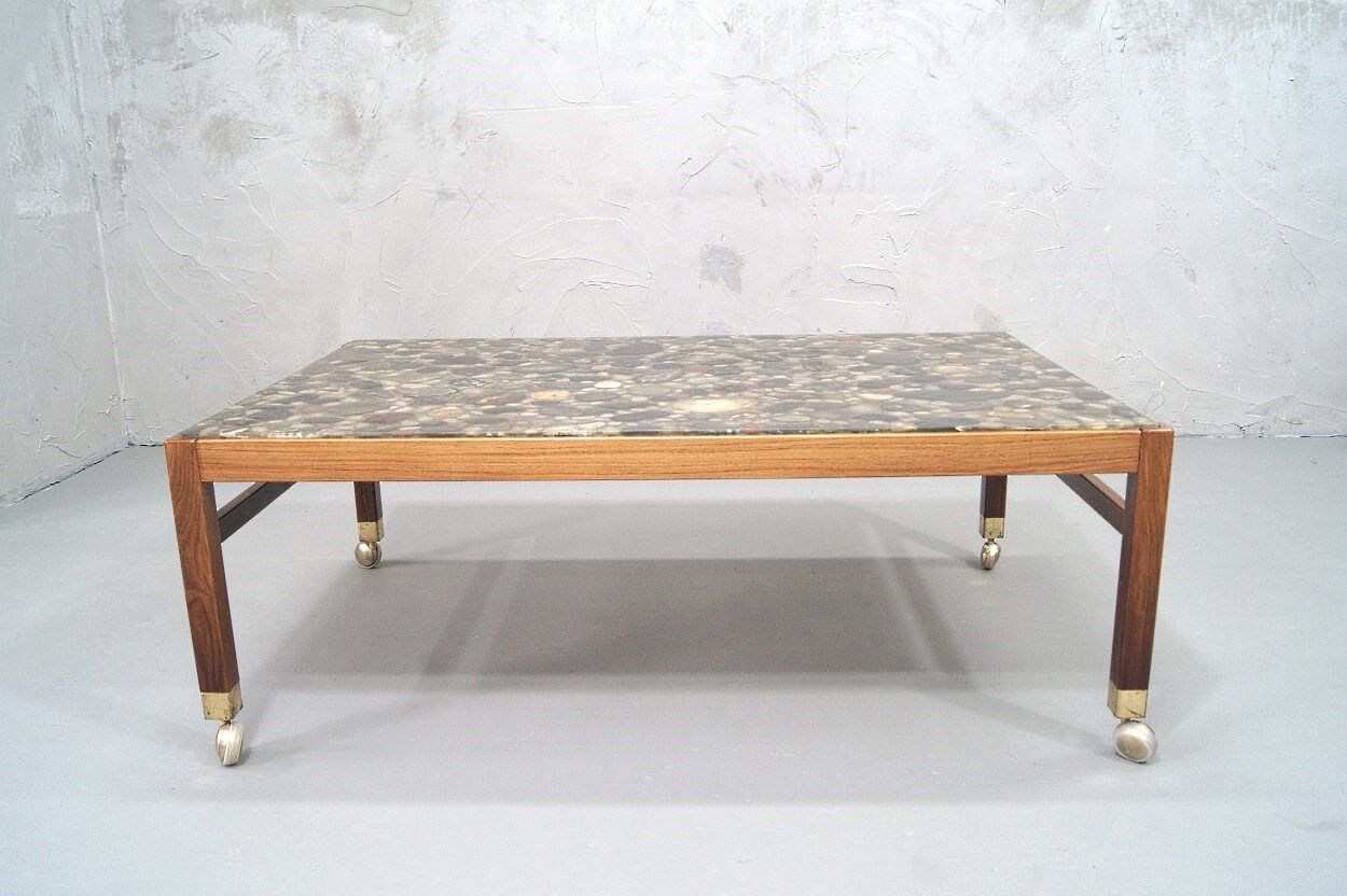 Swedish rosewood and pebbles coffee table in the style of Ib Kofod-Larsen , 1960s