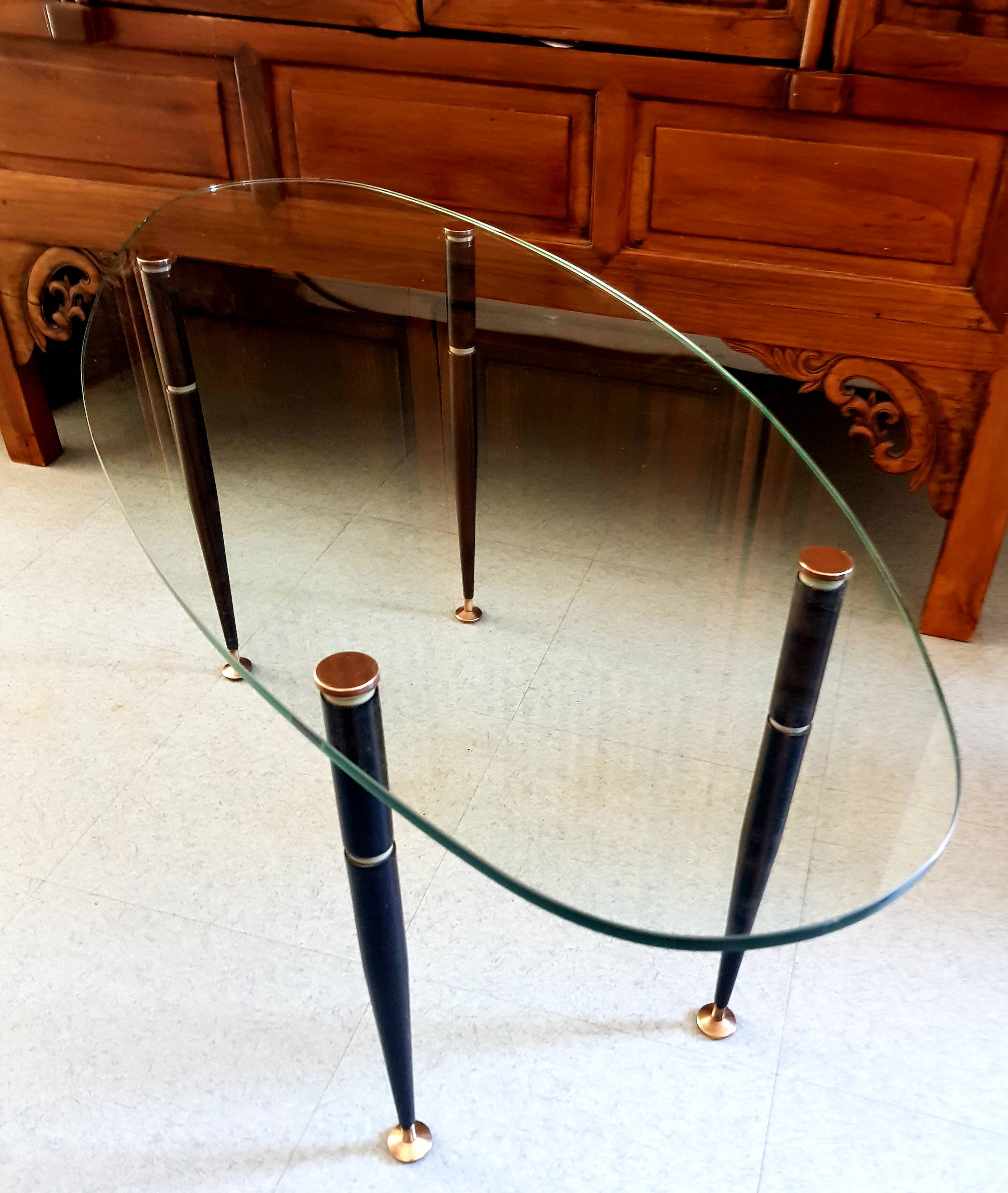 1950 oval coffee table in steel and brass glass