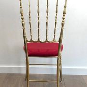 Chiavari chair and stool in brass and velvet. Around 1940.