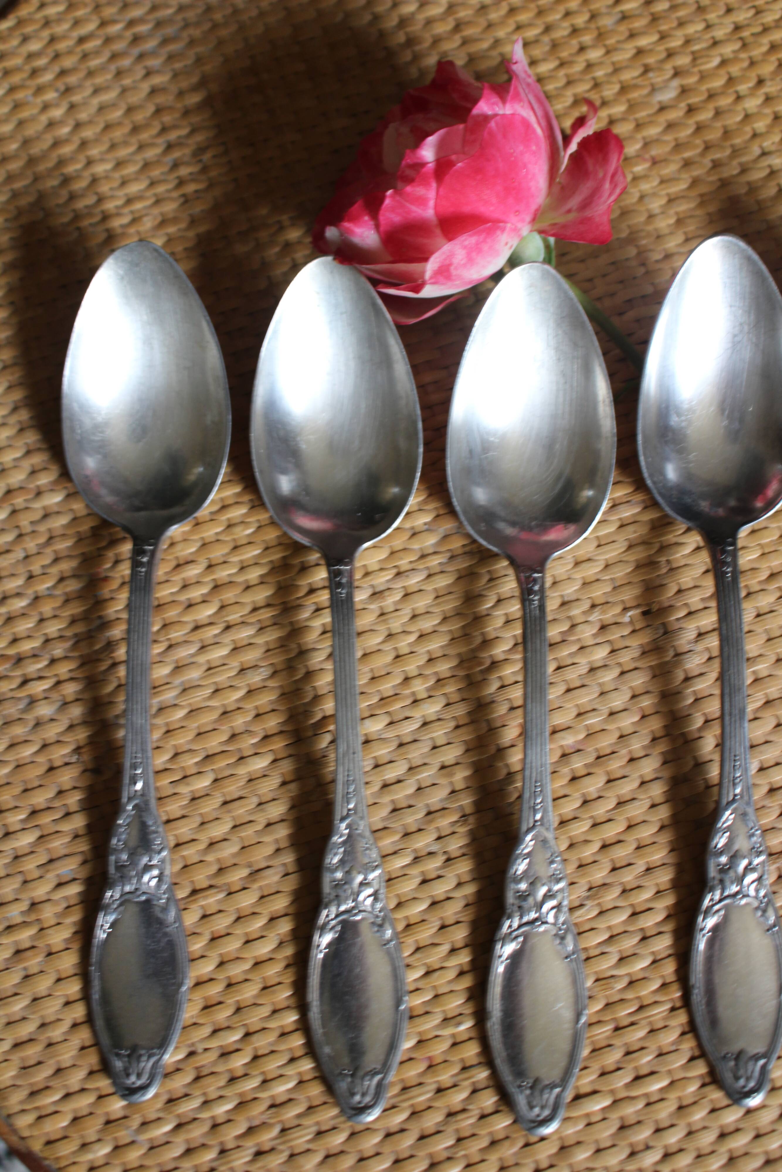 One of 6 silver-plated leafy metal soup spoons