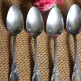 One of 6 silver-plated leafy metal soup spoons
