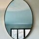 Oval brass mirror, Italy, circa 1960.