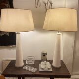 Pair of modernist stone and bronze lamps.