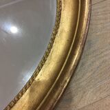 Old mirror gilded wooden frame.