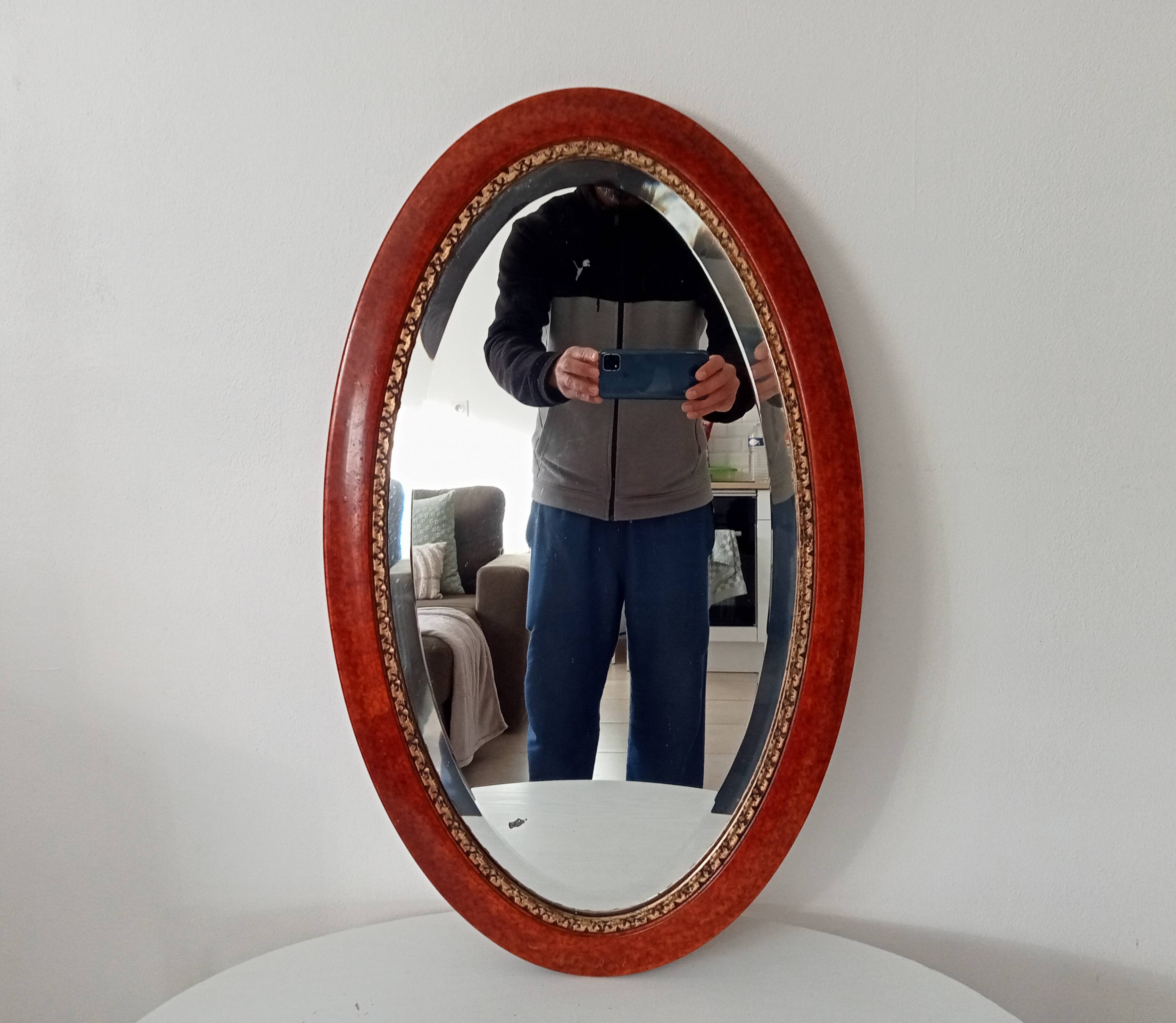 Antique oval mirror with bevelled glass