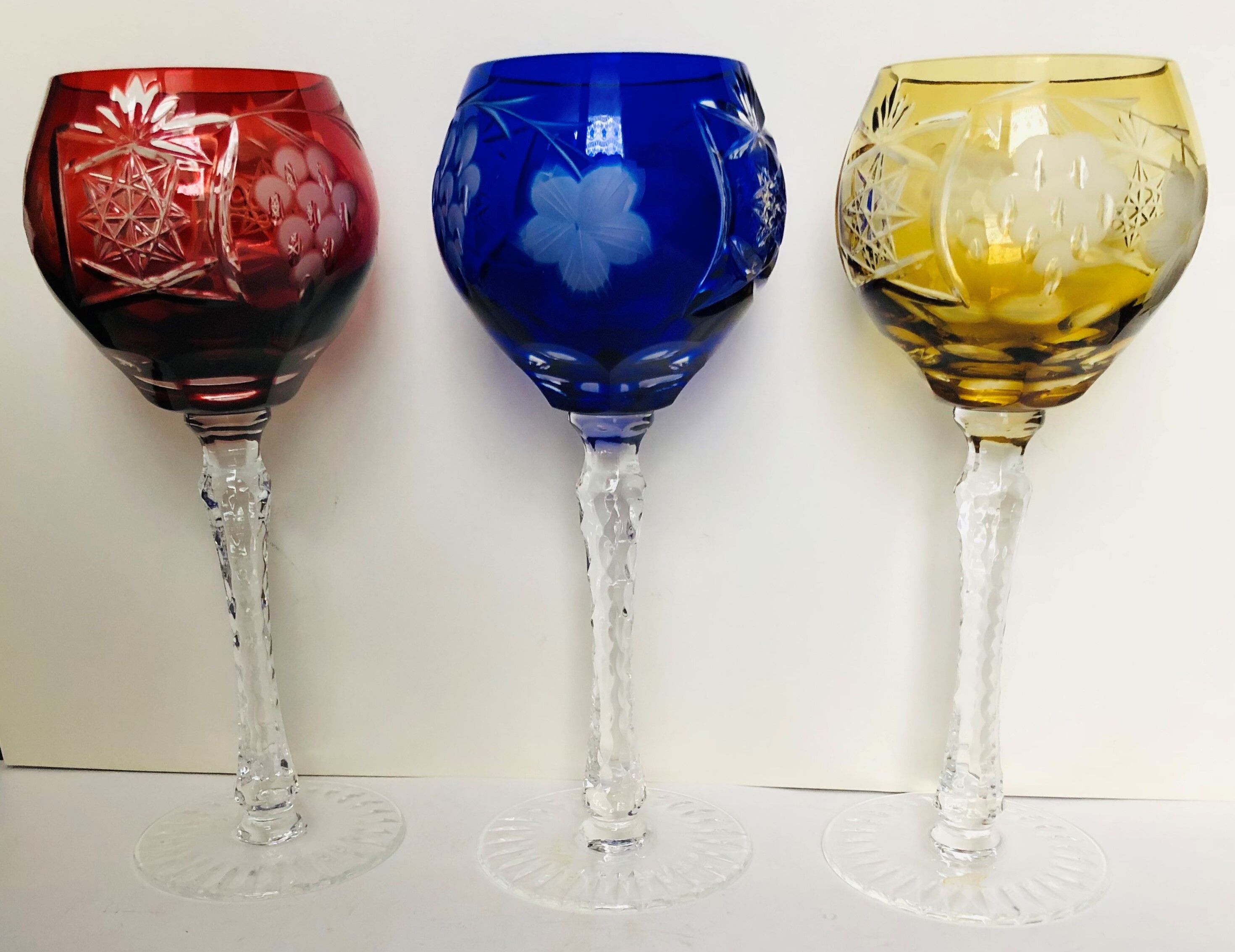 Set of six colored cut crystal wine glasses