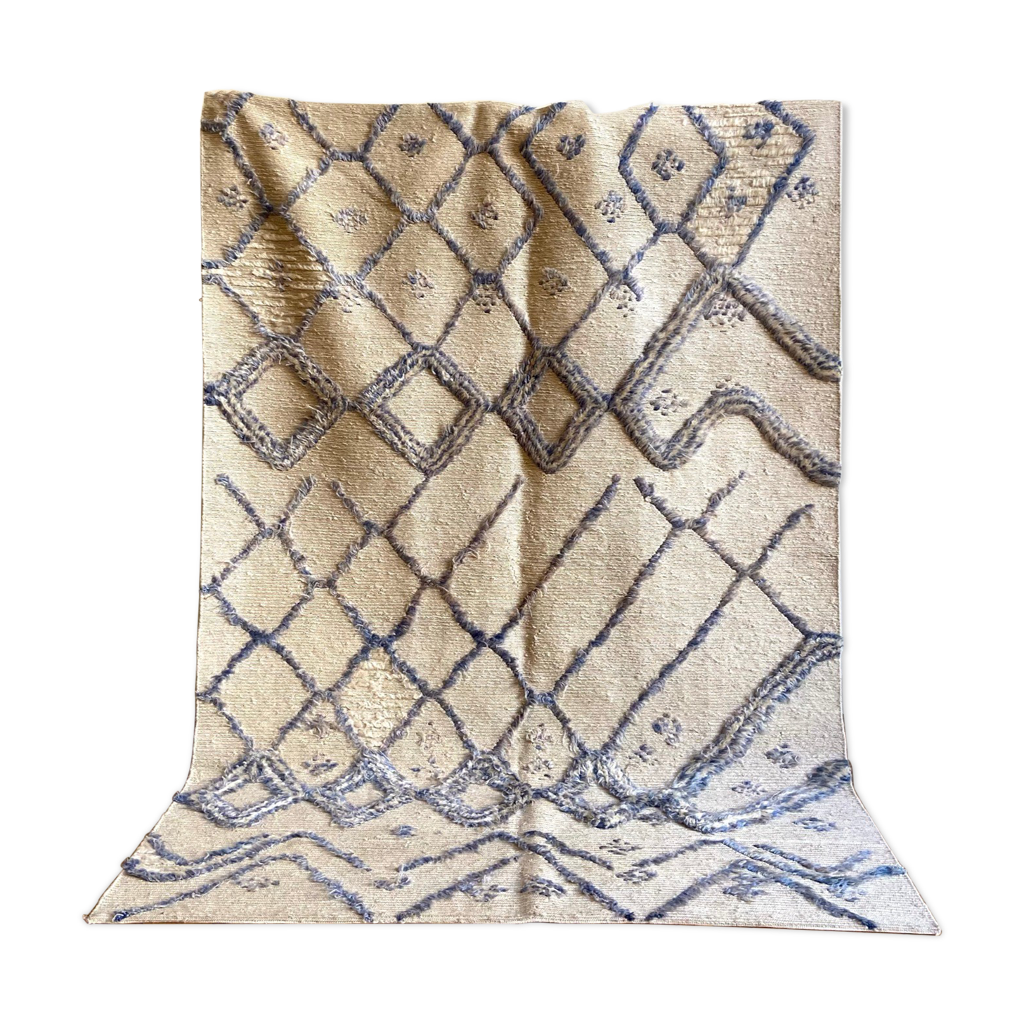 Berber cream carpet with blue patterns