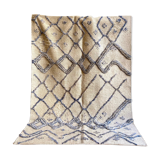 Berber cream carpet with blue patterns