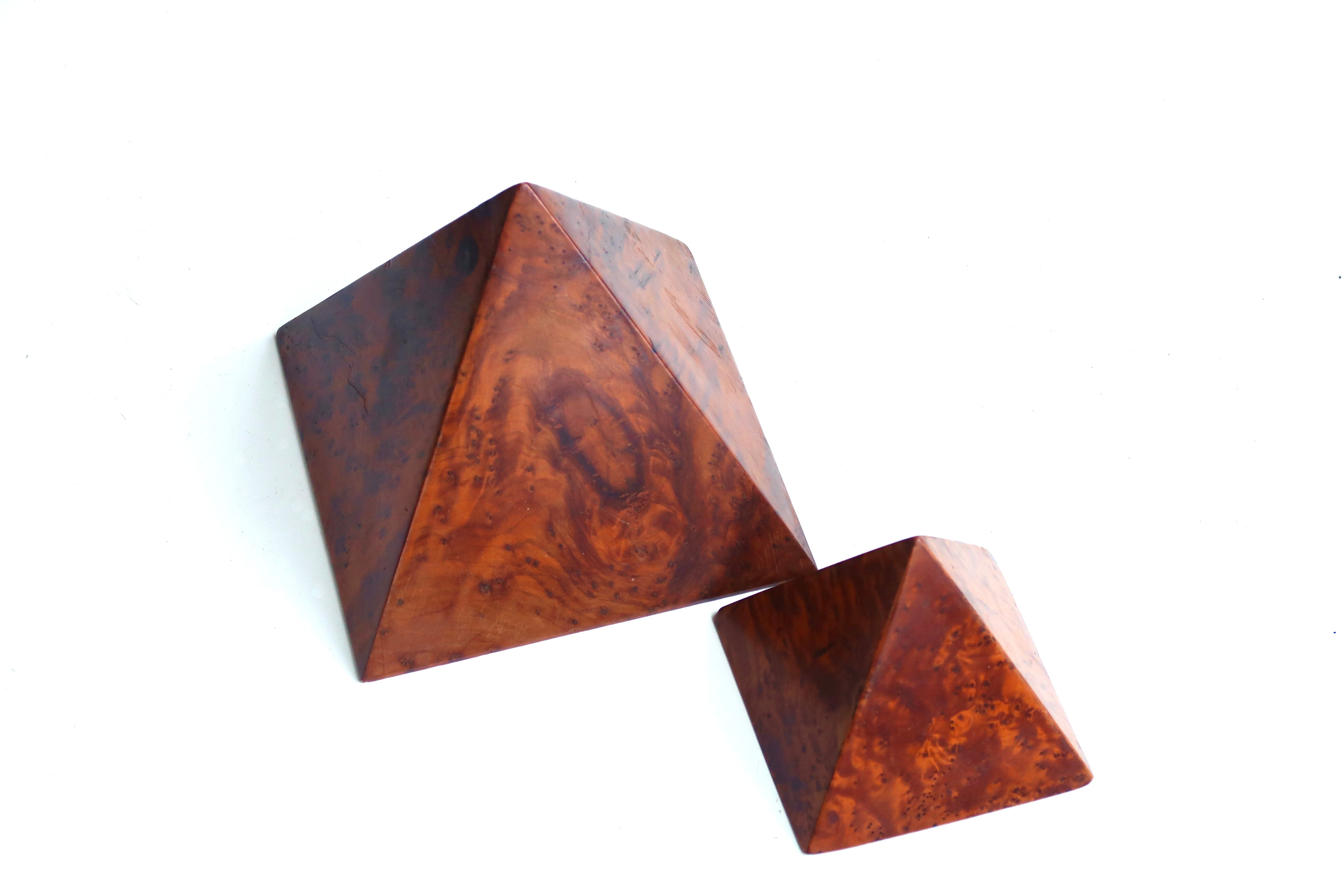 Two wooden pyramids with elm magnifying glass, 70s