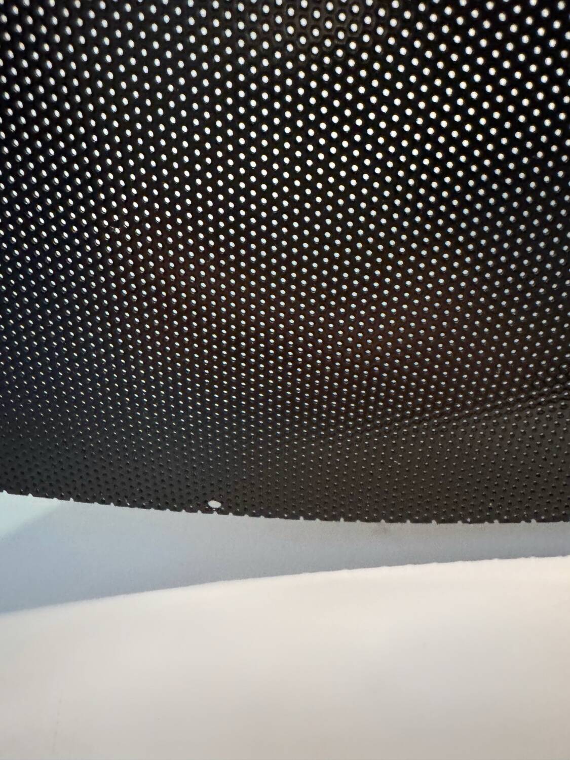 Metal micro-perforated suspension from the 1960s.