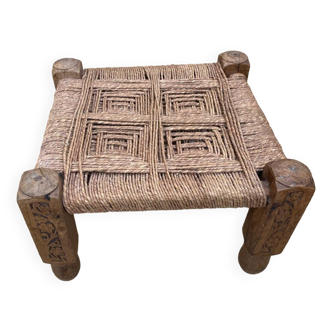 Wooden stool and braided ropes