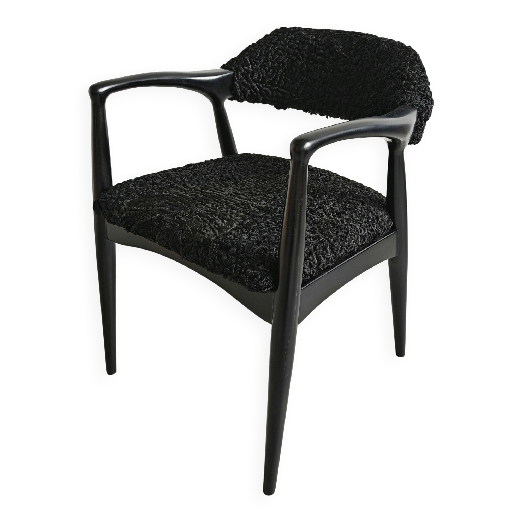Pair of Mid Century Modern armchairs in astrakhan leather.
