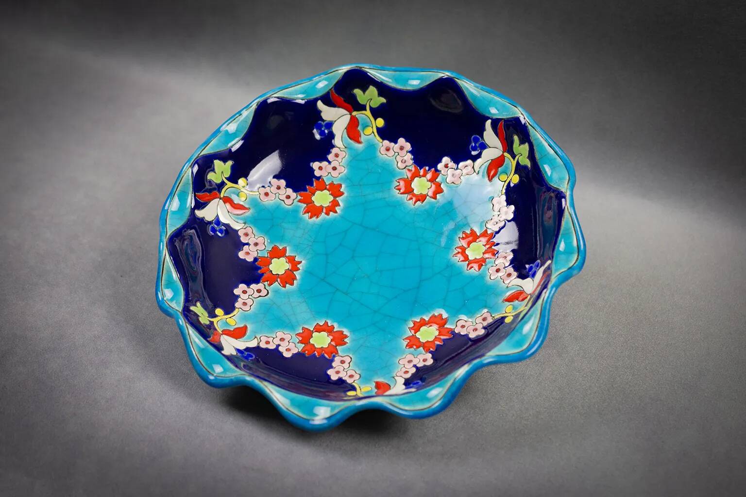 Longwy coupe model Roxane – Floral enamels on a crackled turquoise background