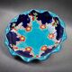 Longwy coupe model Roxane – Floral enamels on a crackled turquoise background