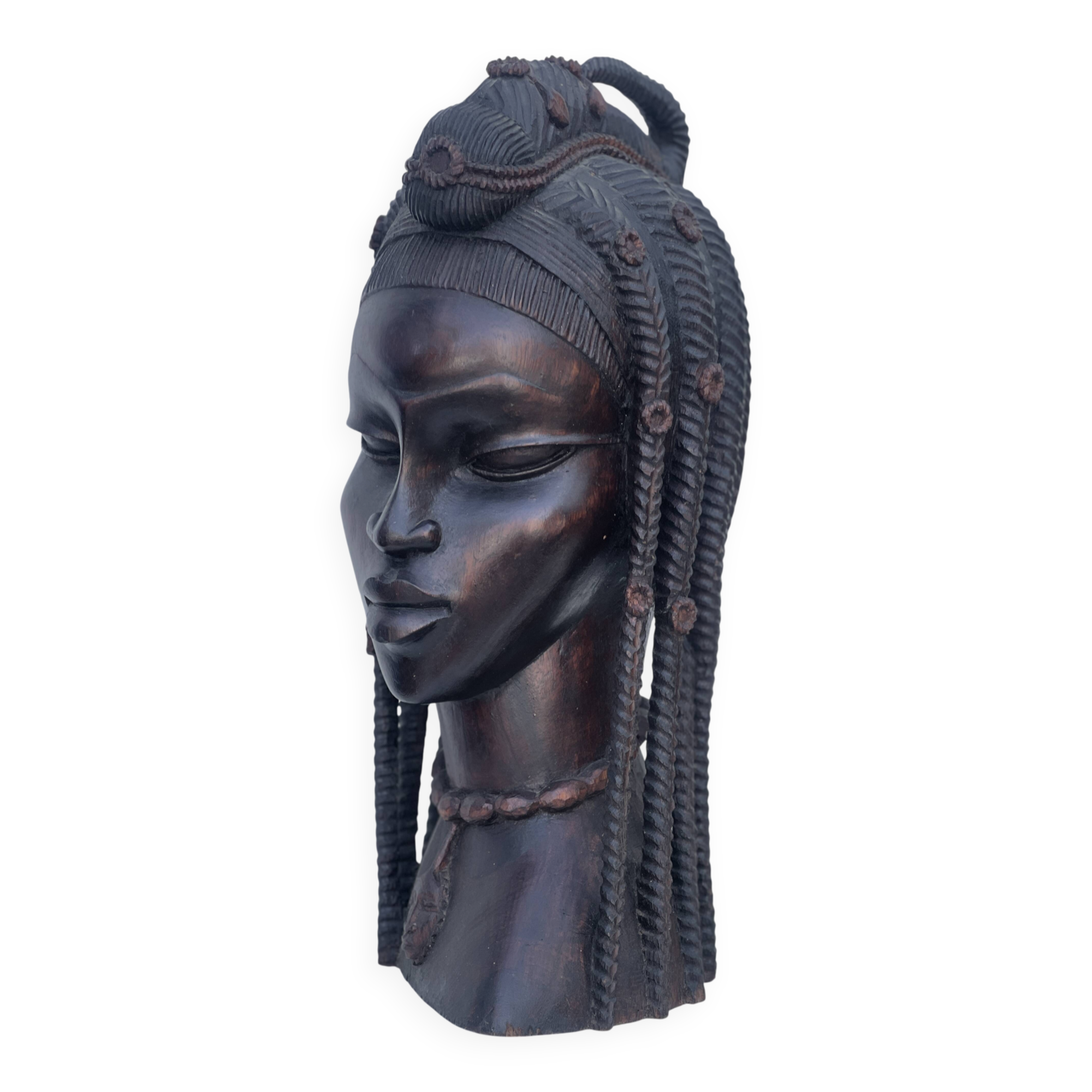 Large wooden bust of an African woman.