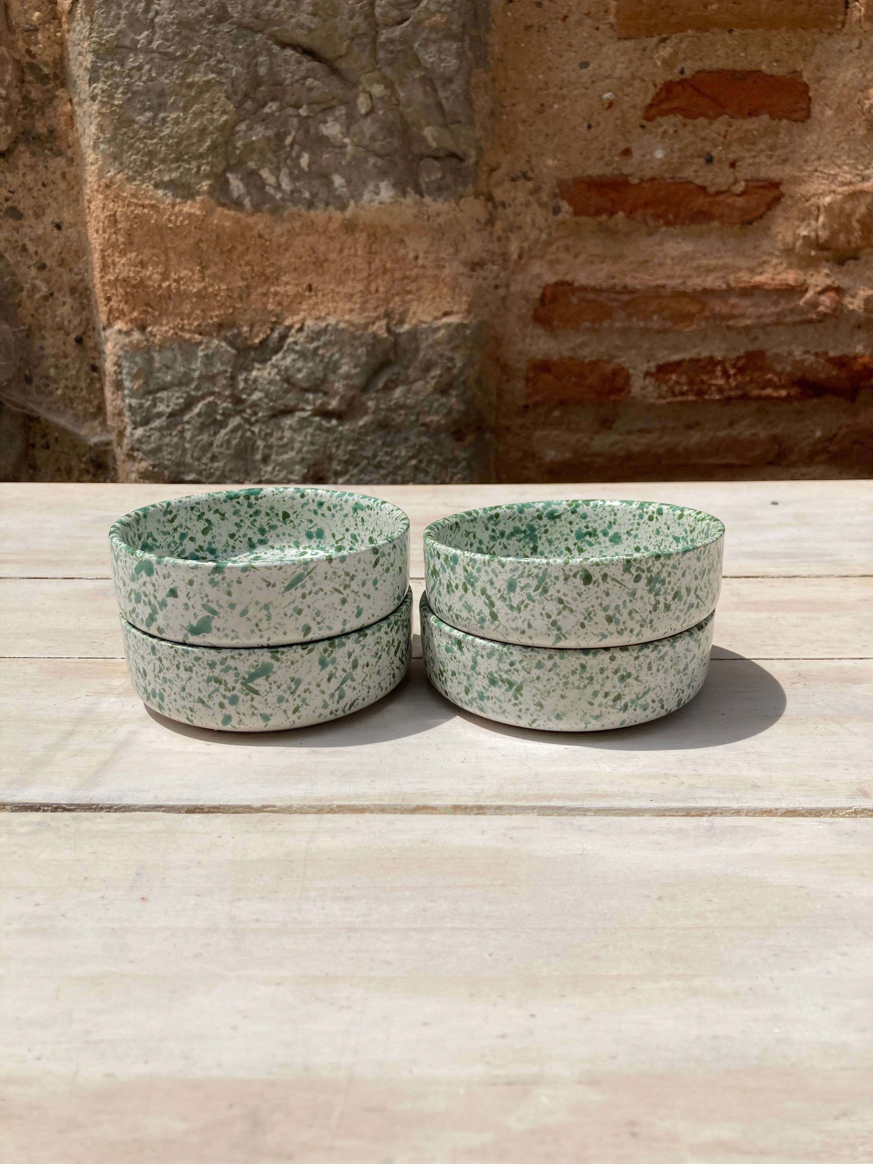 Four spotted green ramekins