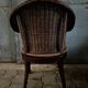4 fauteuils en rotin foncé