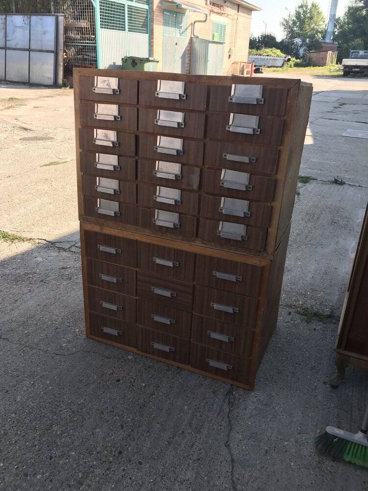 Brown wooden industrial wardrobe, multiple drawers, 1950s, workshop storage, Czech Republic.