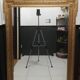 Carved wooden pediment mirror