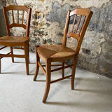 Set of 2 antique wooden and straw chairs.