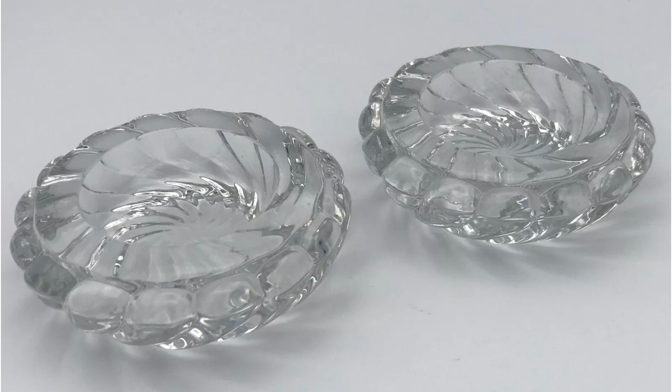 Pair of twisted round candlesticks in baccarat crystal stamped