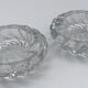 Pair of twisted round candlesticks in baccarat crystal stamped