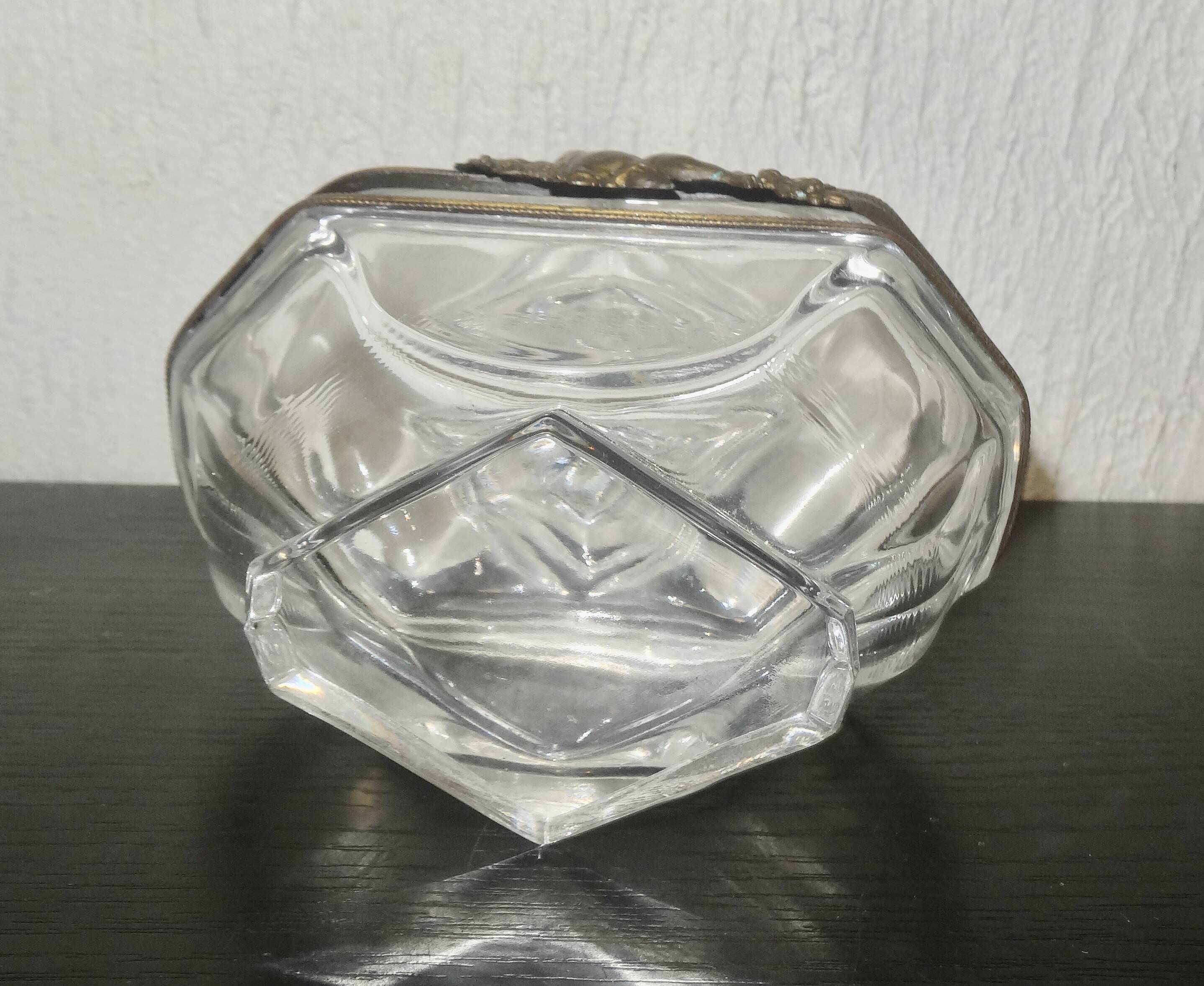 glass jewelry box with brass cherub decoration