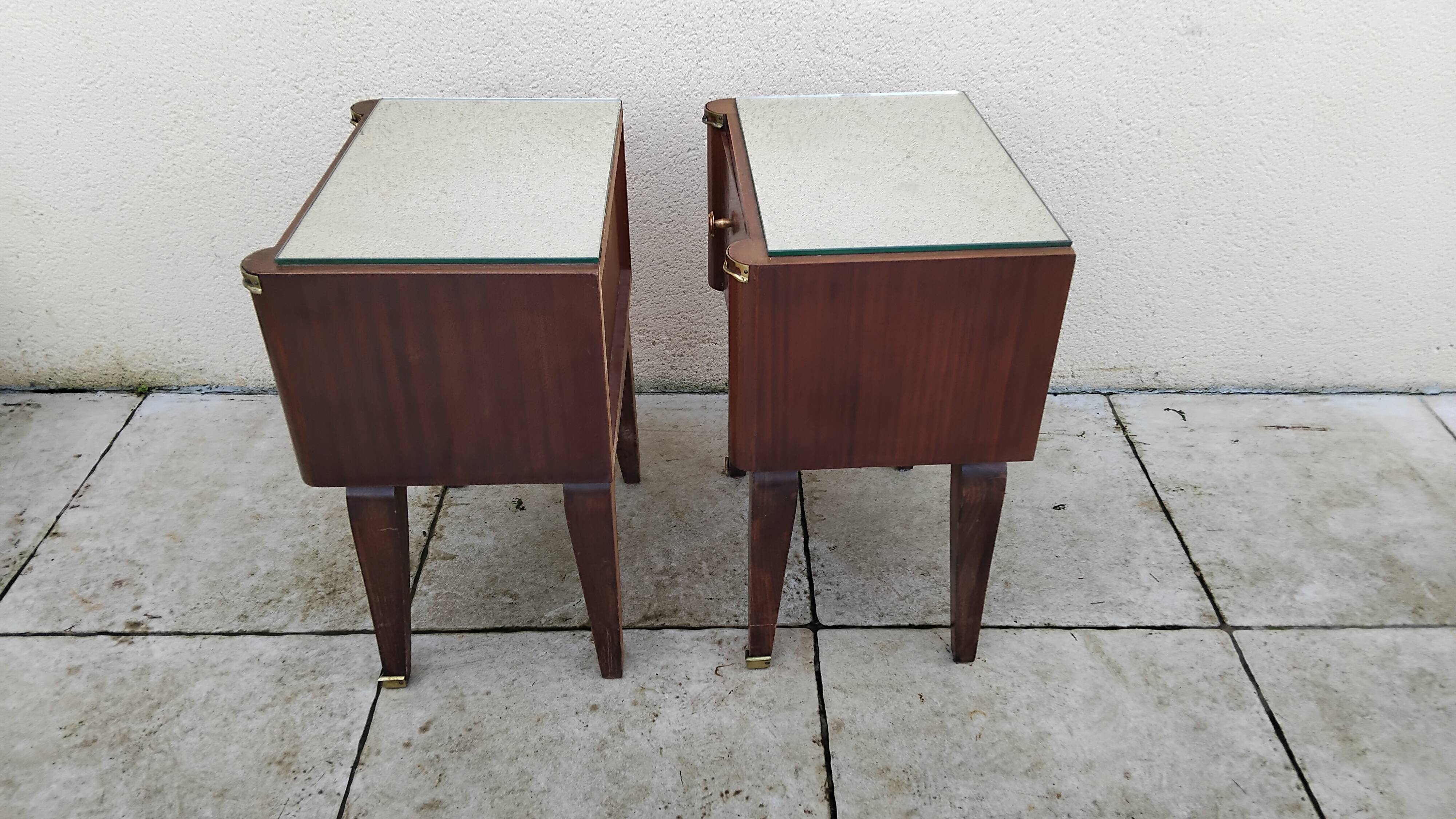 Vintage bedside table with a mirrored top, Art Deco style.