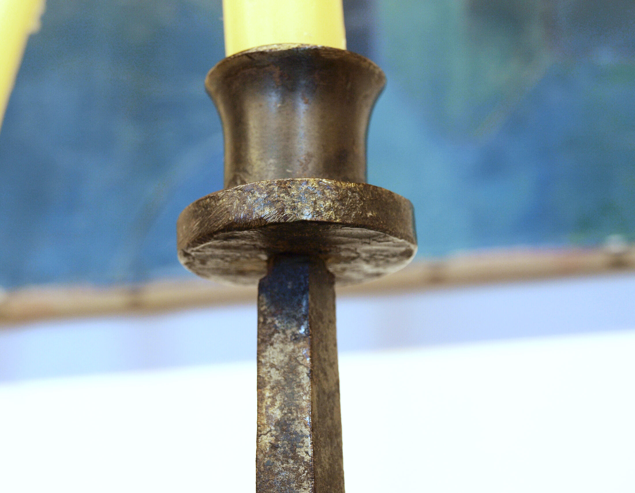 Brutalist wrought iron candle holder beaten