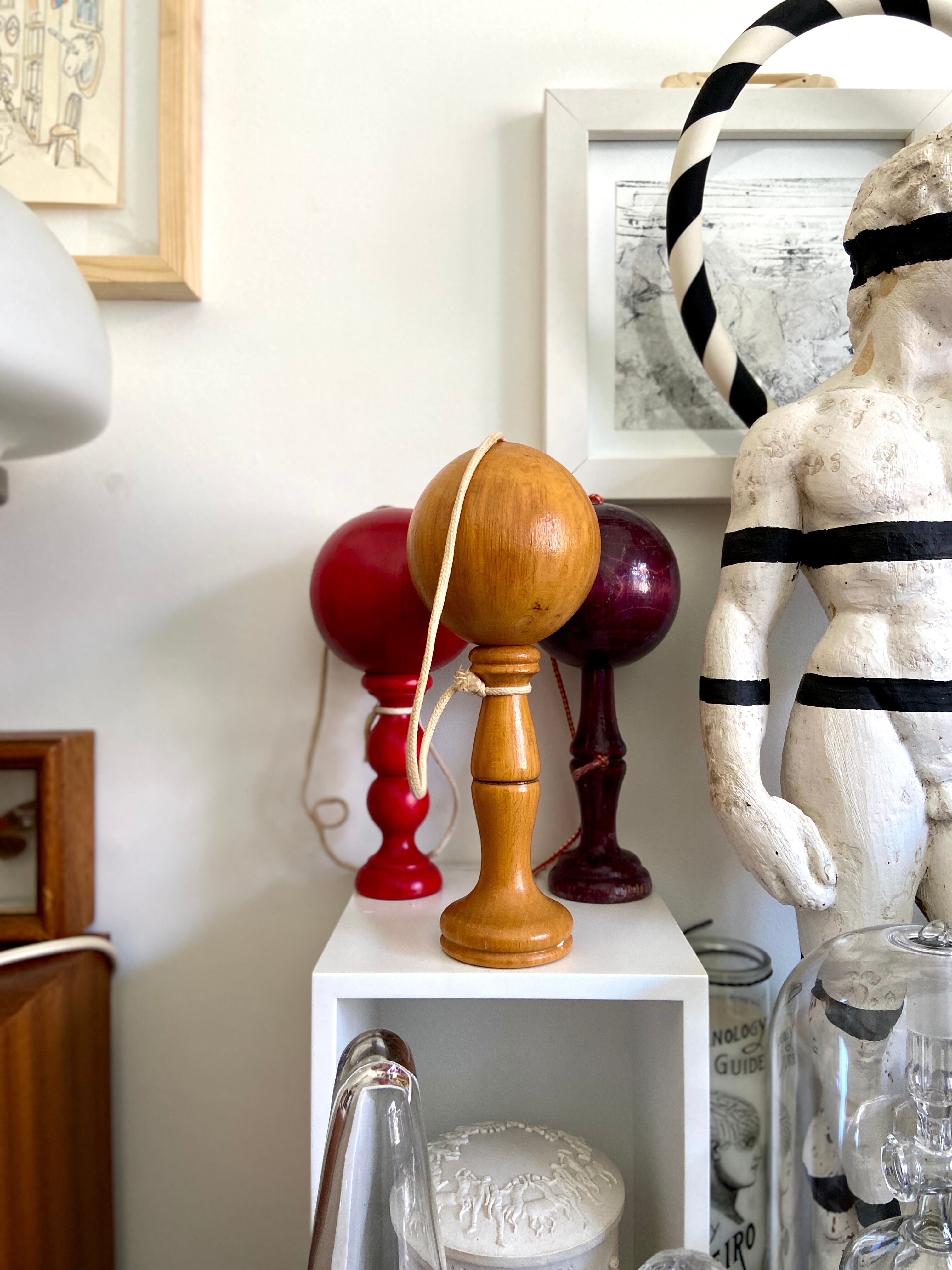 Bilboquet in red wood