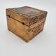 Old jewelry box in wood and gilded stucco